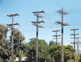 Teliti kebijakan tentang pelanggan yang memenuhi syarat di industri listrik