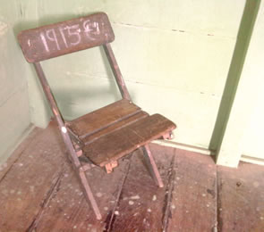 A 1915 chair found inside the first storey building.