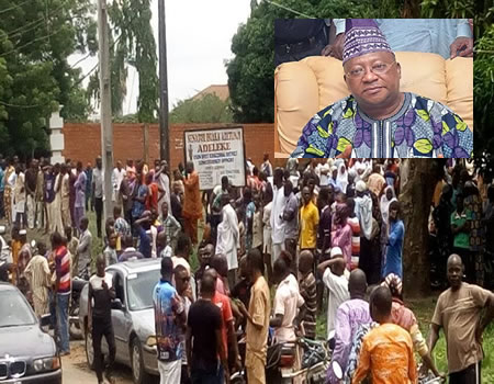 Sympathisers in Senator Isiaka Adeleke's country home. Inset: Senator Adeleke.