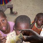 giving alms to beggars
