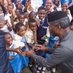 Acting President, Yemi Osinbajo being welcomed by school students during his visit to Calabar, Cross River State