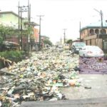 Refuse from canal blocks Lagos street