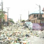Refuse from canal blocks Lagos street