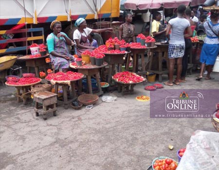 A lull atmosphere at stalls at Igbudu Market in Warri South West LGA, Delta State, on Thursday. Photo: Ebenezer Adurokiya