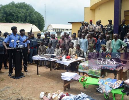 Nigeria Police Force Public Relations Officer, FPRO, Jimoh Moshood parading robbery and kidnapping suspects on Tuesday at Abuja. Photo: Jacob Segun Olatunji