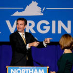 Democrats win bitter Virginia governor's race in setback for Trump