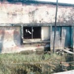 Flood kills 16, Flood sacks three communities