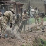 Soldiers during environmental sanitation