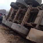 Villagers scoop fuel, tanker