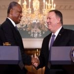 Nigeria's Minister of Foreign Affairs Geoffrey Onyeama, left, shakes hands with Secretary of State Mike Pompeo, Tuesday, Feb. 4, 2020, at the State Department in Washington