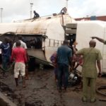tanker, scooping petrol from fallen tankers