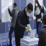 South Koreans head to polls, coronavirus