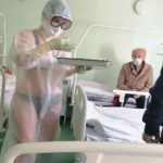 Nurse disciplined after wearing only lingerie under see-through PPE gown in Russia
