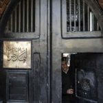 Egypt says jailed filmmaker, alcohol poisoning