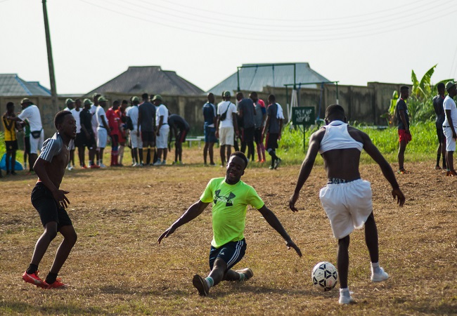 Youths storm open field