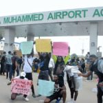 PHOTO NEWS: #EndSARS protesters at Lagos international airport