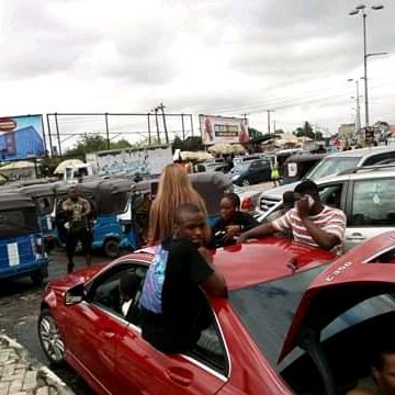 PHOTO NEWS: #EndSARS protesters take over Warri street