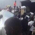 thousands storm warehouse