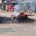 Mob burns two suspected robbers