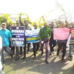 Delta youths block East-West road,