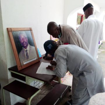 Mourners weep uncontrollably