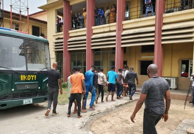 Police arraign 60