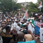 Youths troop out