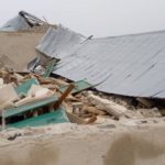 Rainstorm destroys houses