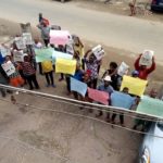 Newspaper vendors protest police
