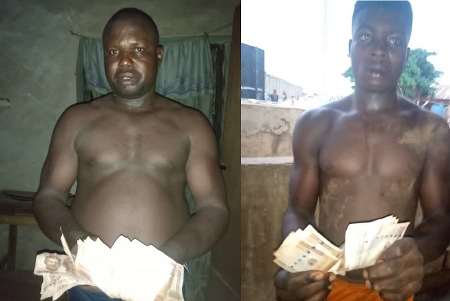Two arrested for buying