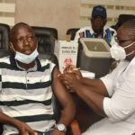 Minister receives second jab