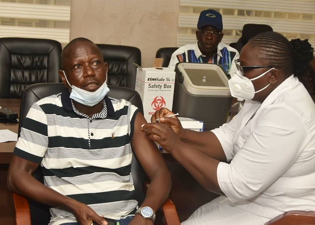 Minister receives second jab