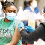 How effective vaccination can keep schools open