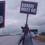 Policemen disperse #BuhariMustGo
