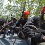 Gunmen kill ebeaugwu commander Hoodlums attack INEC offices, Gunmen abduct five family members, Abuja bandits attack, Gunmen abduct Catholic Priest, Gunmen kill policeman, Gunmen strike in Ekiti, Gunmen kill security operative Gunmen kill one, Abductors of former gubernatorial aspirant in Plateau demand N100 million ransom, Gunmen abduct school teacher, Gunmen, bandits, gunmen attack UniAbuja lecturer
