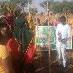 trains people on drip irrigation