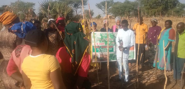 trains people on drip irrigation