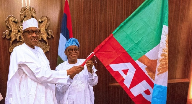 Buhari presents APC flag to Oyetola