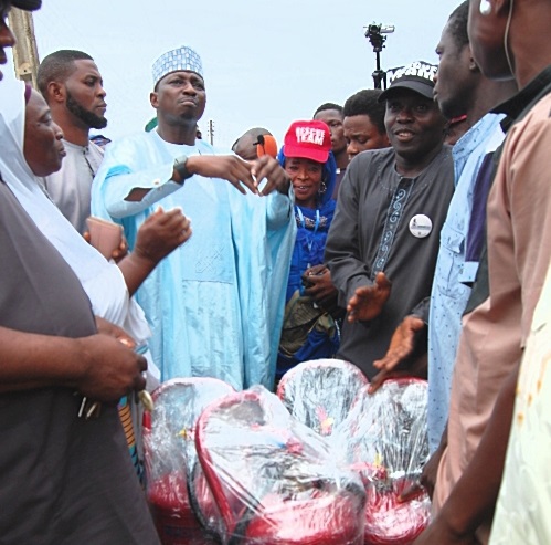 PDP reps candidate donates industrial fire extinguishers to Kwara market