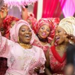 Wedding hashtags, guest at wedding ‘owambe’ party 