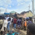 Midnight fire razes shops,