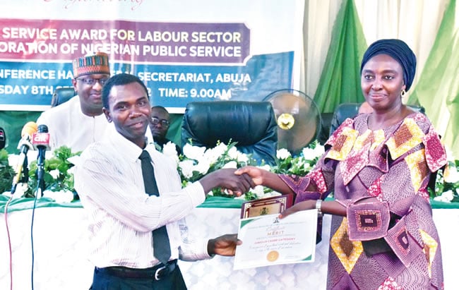 FG awards excellent performance to 15 workers, pledge to sanction unproductive civil servants