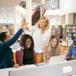 Joyful American Students in Library Abroad
