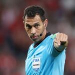 Referee hands out ,