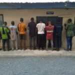 Police arrest nine suspected
