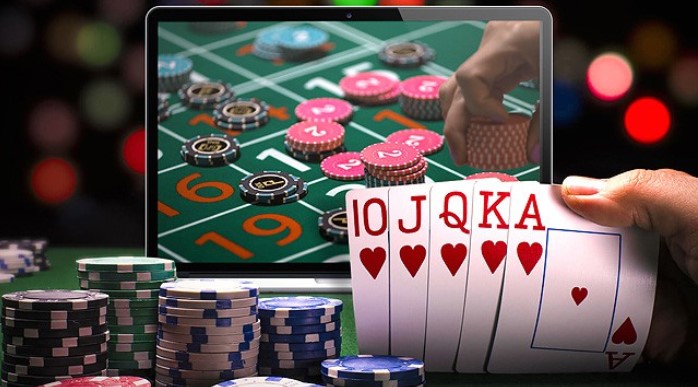 Casino Chips and cards with Laptop