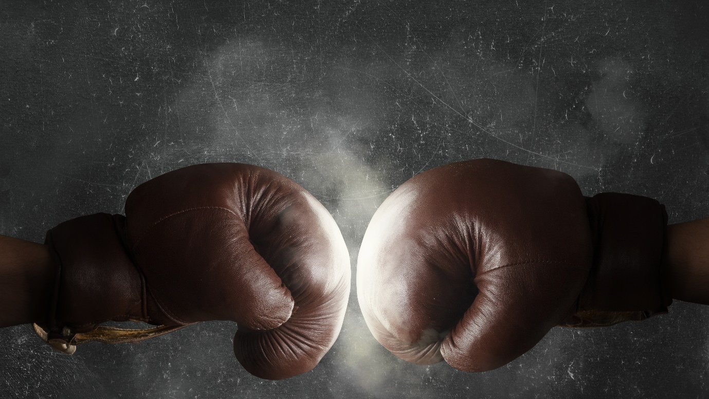 Two hands with boxing gloves