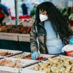 Woman shopping locally. Shopping locally can help you spend less on food