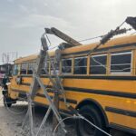 Rainstorm destroys electric poles,