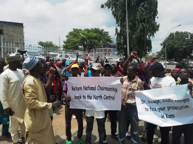 Hoodlums Ganduje protesters